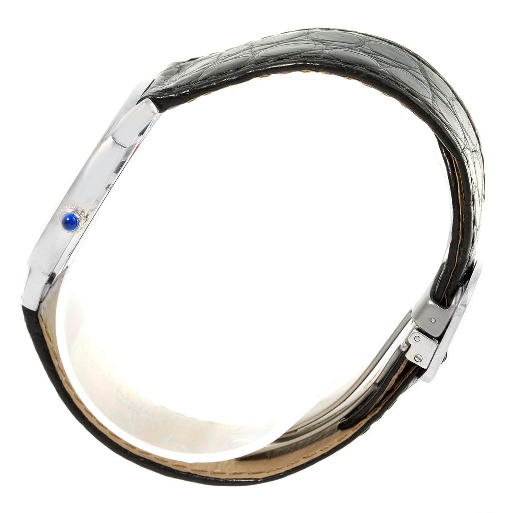 The image shows a side view of a Cartier Ronde W6700255 Stainless Steel Silver Dial W6700255 Stainless Steel Silver Dial watch, highlighting its slim case and leather strap with a buckle clasp.