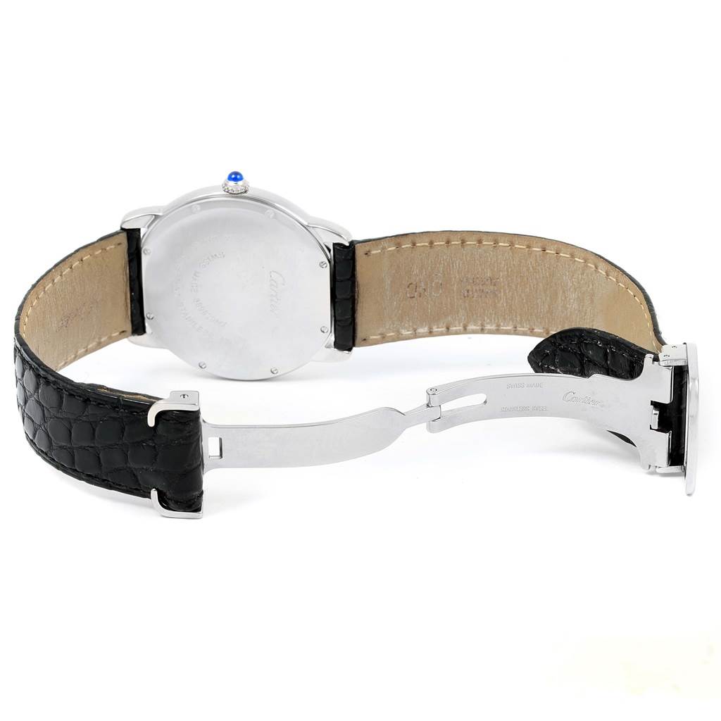 The image shows the back of the Ronde model by Cartier, featuring an opened leather strap and visible clasp mechanism.