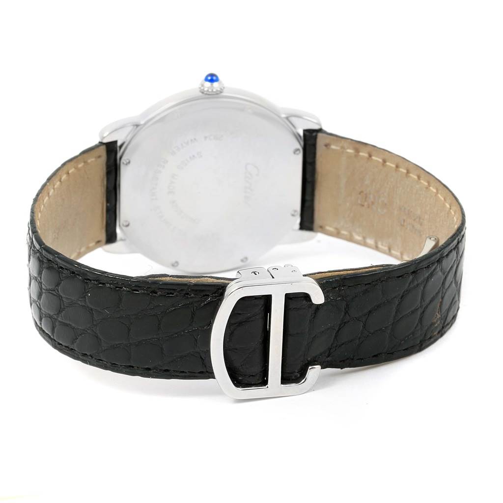 The image shows the back view of a Ronde model Cartier watch, featuring its case and black leather strap with a silver buckle.