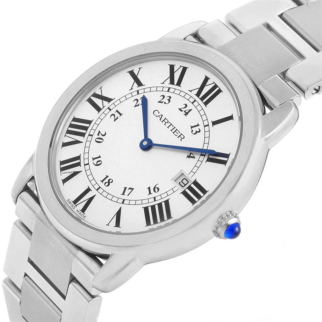 The image shows a Cartier Ronde W6701005 Stainless Steel Silver Dial W6701005 Stainless Steel Silver Dial watch at an angled view, highlighting the face, bezel, bracelet, and crown with a blue cabochon.