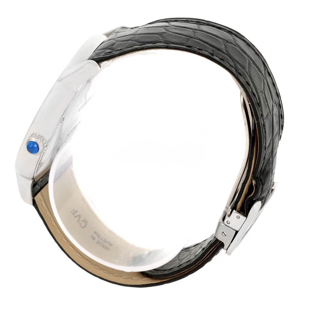 This image shows a side view of a Cartier Ronde W6701010 Men
s Stainless Steel Silver Dial W6701010 Men
s Stainless Steel Silver Dial watch, highlighting its black leather strap and the crown with a blue cabochon.