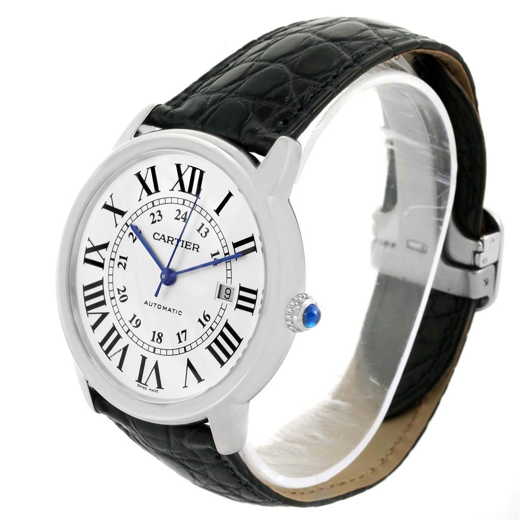 The Cartier Ronde W6701010 Men
s Stainless Steel Silver Dial W6701010 Men
s Stainless Steel Silver Dial wristwatch is shown at a 3/4 angle, revealing its white dial, Roman numerals, blue hands, black leather strap, and sapphire crown.