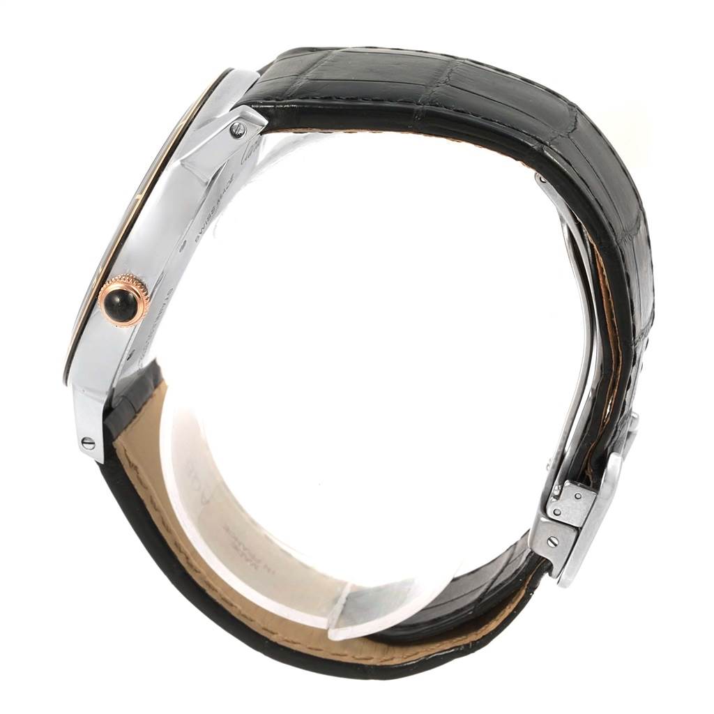 The image shows a side view of the Cartier Ronde W2RN0005 Stainless Steel Grey Dial W2RN0005 Stainless Steel Grey Dial model, featuring its case, crown, and leather strap.