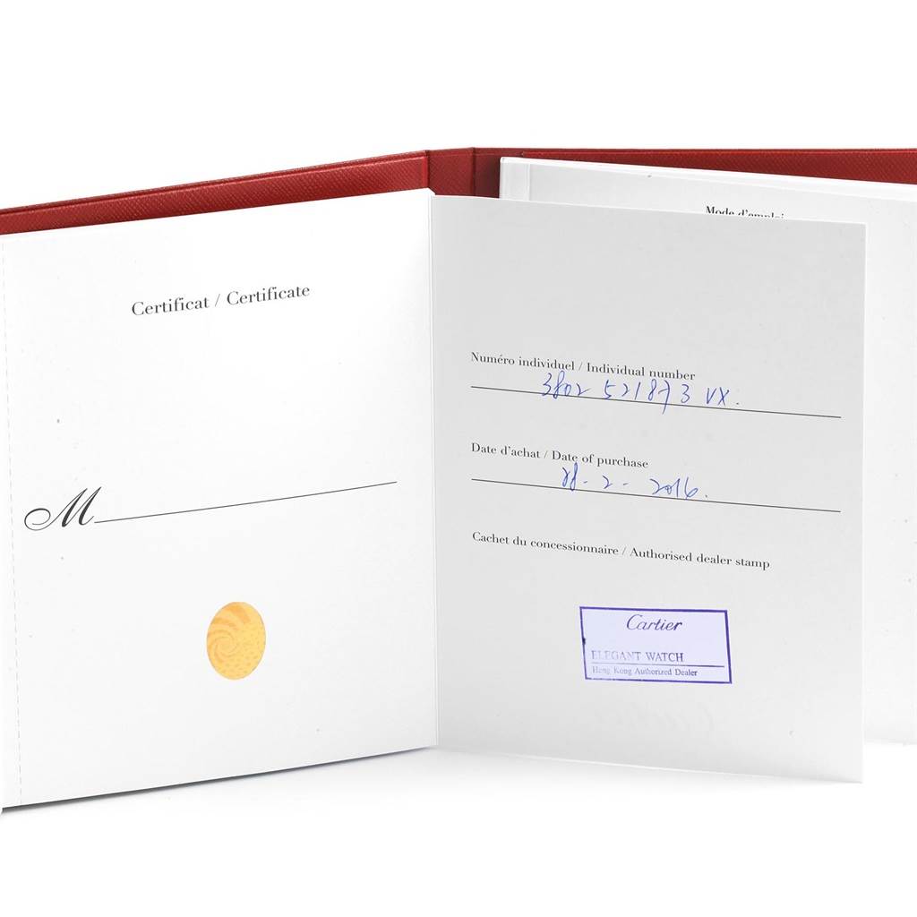 The image shows an open warranty booklet for the Ronde model by Cartier, displaying the certificate and purchase details.