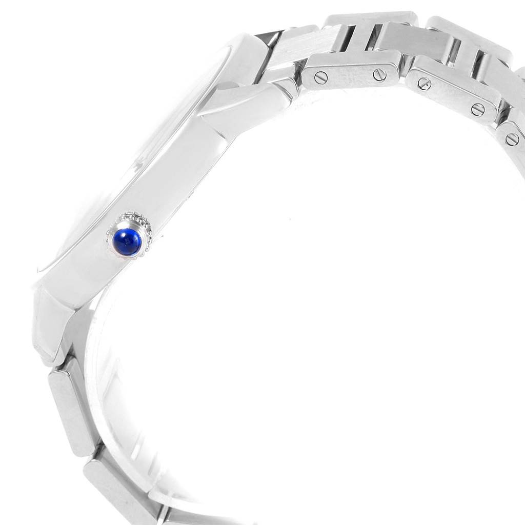 The image displays a side view of the Cartier Ronde W6701011 Men's Stainless Steel Silver Dial W6701011 Men's Stainless Steel Silver Dial watch, focusing on the bracelet, case, and blue cabochon crown.