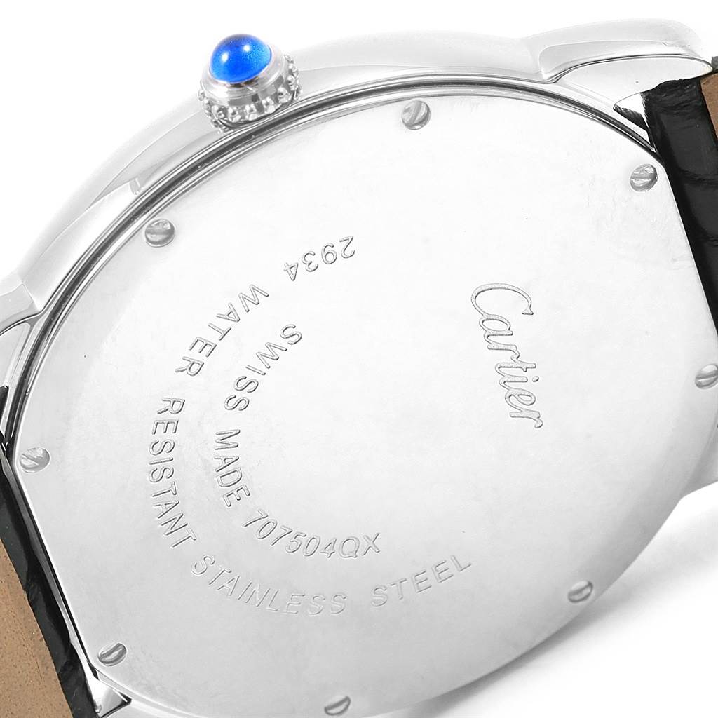 This is an image of the back case and crown of a Cartier Ronde W6700255 Stainless Steel Silver Dial W6700255 Stainless Steel Silver Dial watch, showing "Cartier" and "Swiss Made" engravings.