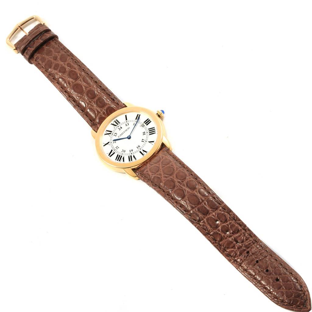 The image shows a Cartier Ronde W6700455 Men's Steel and Gold (two tone) Silver Dial W6700455 Men's Steel and Gold (two tone) Silver Dial watch from a top-down angle, displaying the dial and full leather strap.