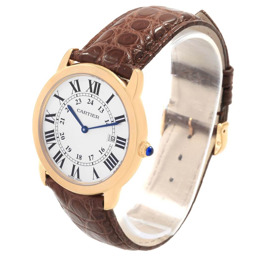 The image shows a Cartier Ronde W6700455 Men's Steel and Gold (two tone) Silver Dial W6700455 Men's Steel and Gold (two tone) Silver Dial watch at an angle displaying the face, bezel, crown, and leather strap.