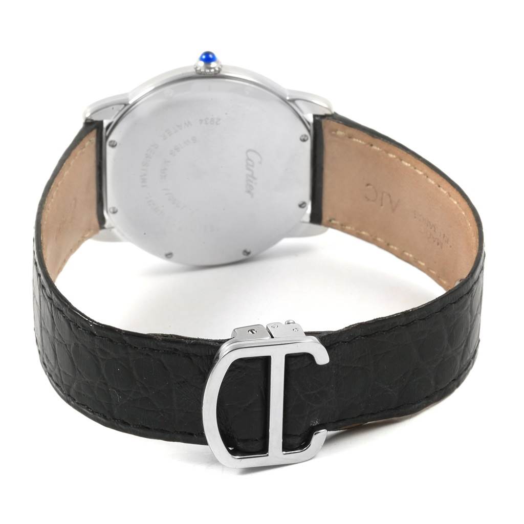 The image shows the back view of a Cartier Ronde W6700255 Stainless Steel Silver Dial W6700255 Stainless Steel Silver Dial model watch, highlighting its case back and leather strap with a "C" buckle.