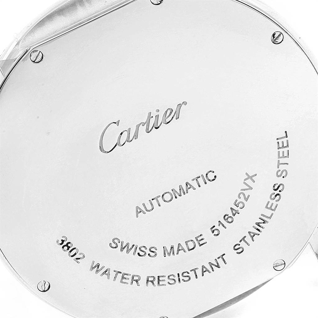 The image shows the back case of the Cartier Ronde W6701010 Men
s Stainless Steel Silver Dial W6701010 Men
s Stainless Steel Silver Dial watch, highlighting the engravings and screws.