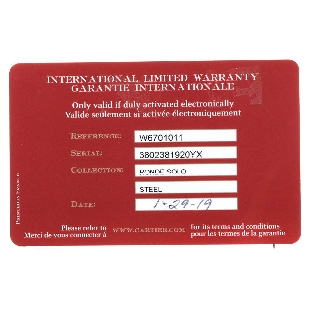 The image shows an international limited warranty card for the Cartier Ronde W6701011 Men's Stainless Steel Silver Dial W6701011 Men's Stainless Steel Silver Dial Solo watch.