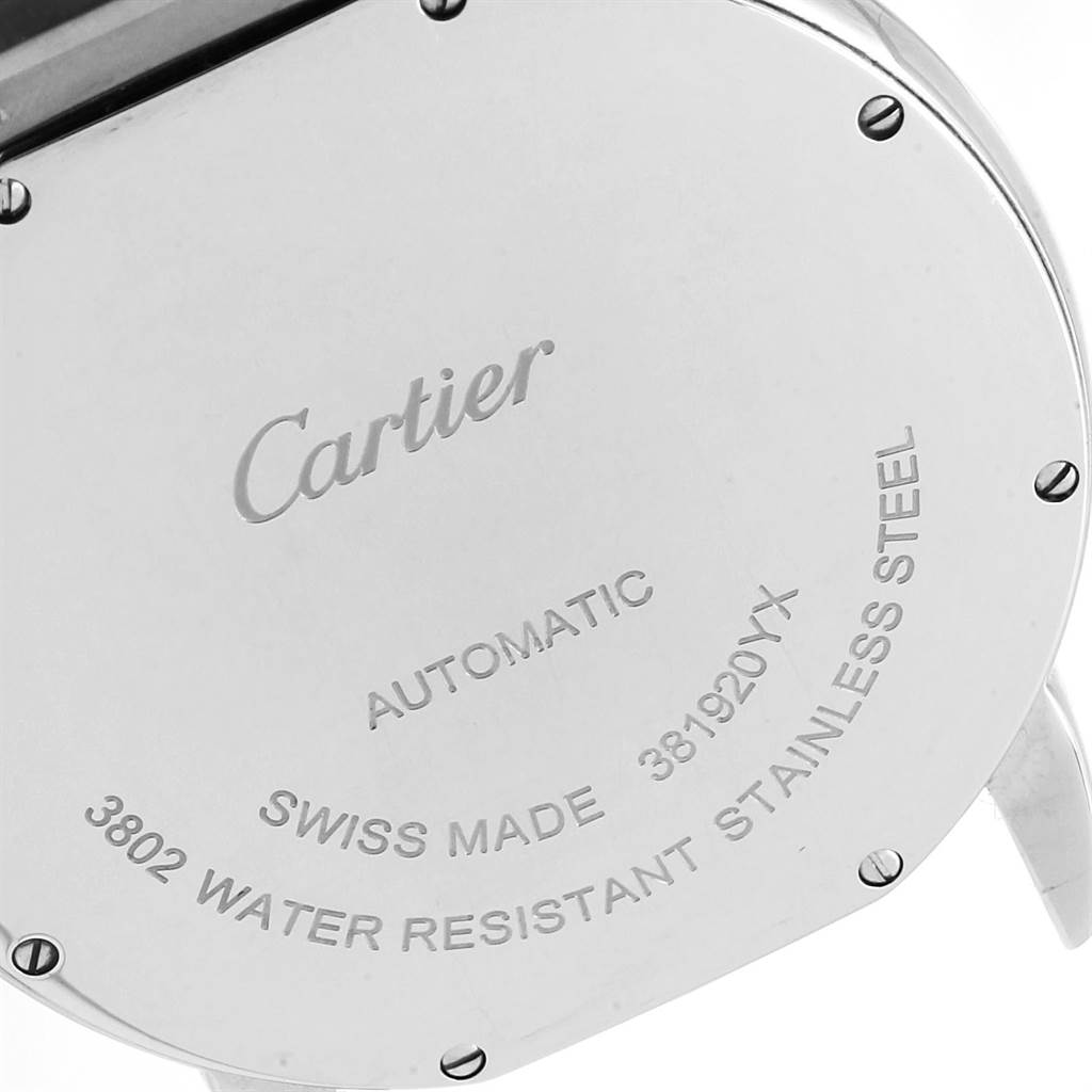 The image shows the back case of a Cartier Ronde W6701011 Men's Stainless Steel Silver Dial W6701011 Men's Stainless Steel Silver Dial watch, highlighting its inscriptions and screws.