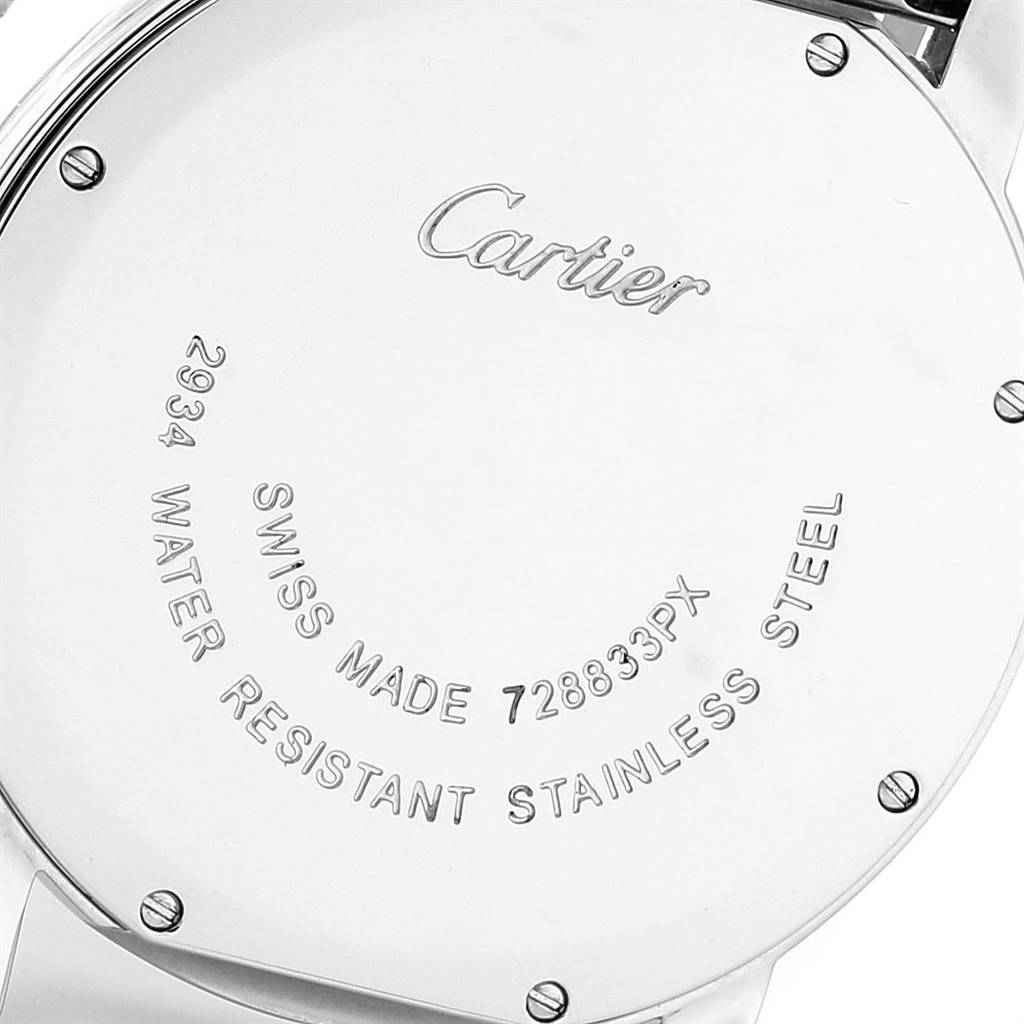 The image shows the back case of a Cartier Ronde W6701005 Men's Stainless Steel Silver Dial W6701005 Men's Stainless Steel Silver Dial watch, displaying engraved details and screws.