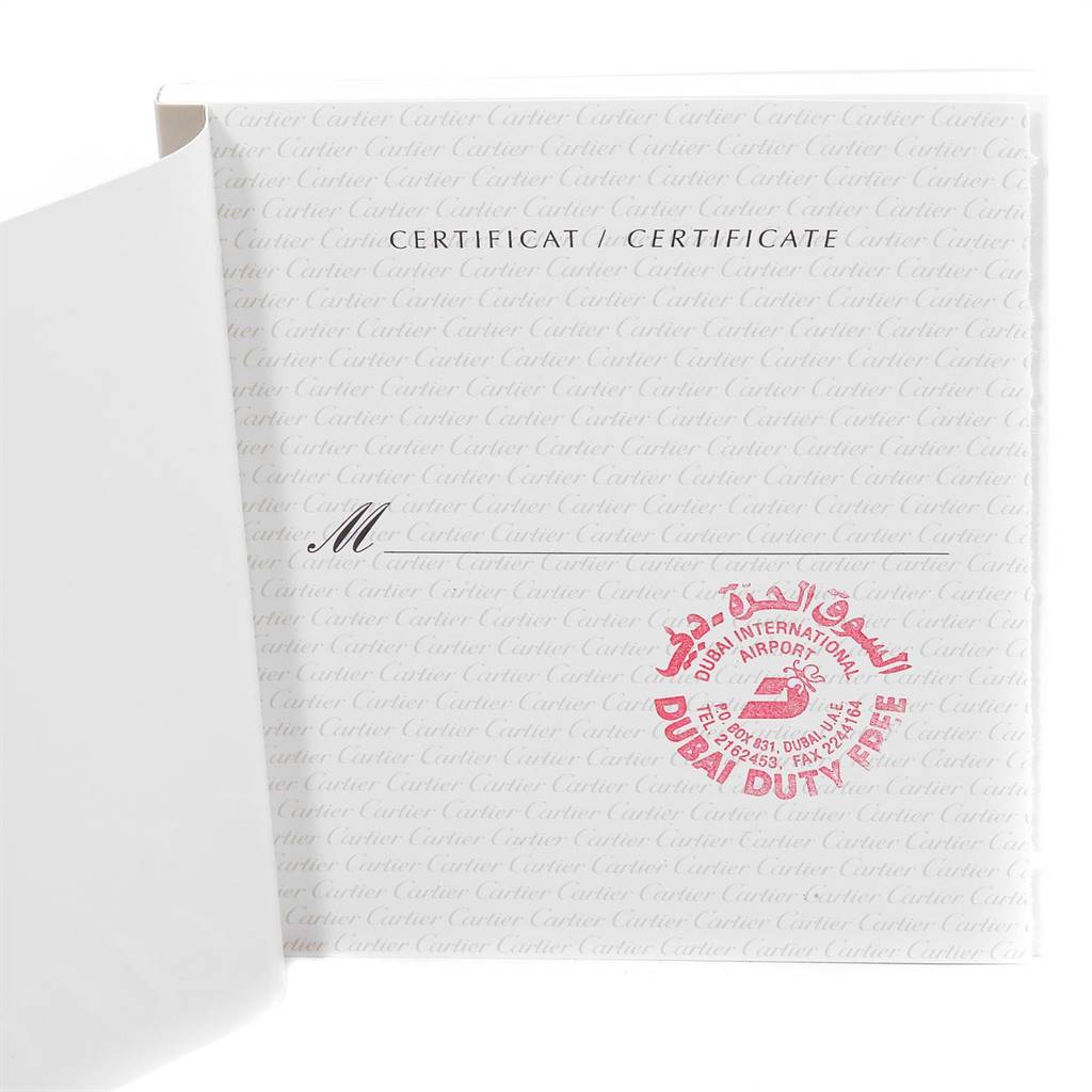The image shows a close-up of a certificate for the Cartier Ronde W6700255 Stainless Steel Silver Dial W6700255 Stainless Steel Silver Dial model watch, featuring Dubai Duty Free stamps.