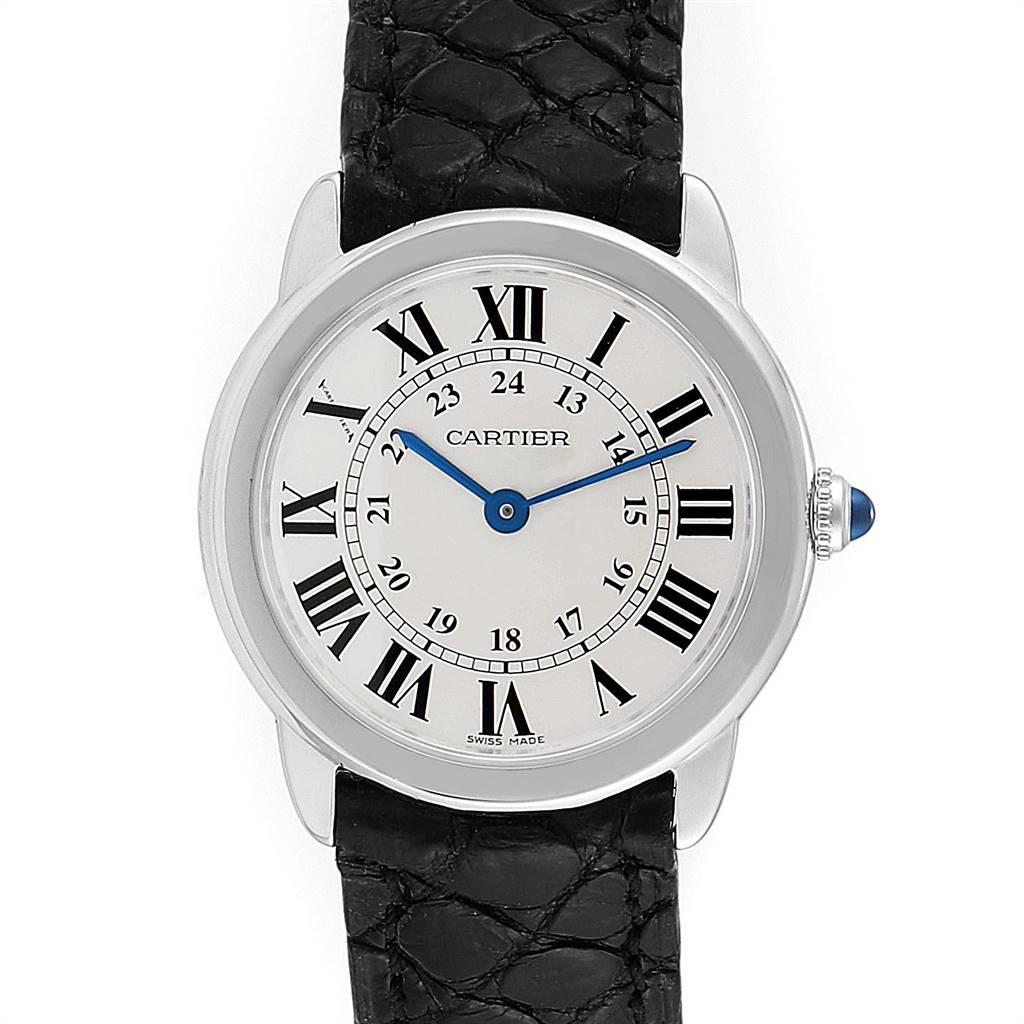 The image shows a front view of a Cartier Ronde W6700155 Women's Stainless Steel Silver Dial W6700155 Women's Stainless Steel Silver Dial watch featuring a white dial, blue hands, Roman numerals, and a black leather strap.
