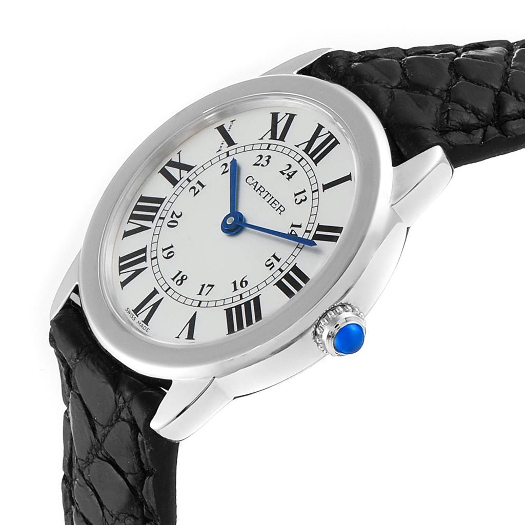 The image shows a side angle of the Cartier Ronde W6700155 Women's Stainless Steel Silver Dial W6700155 Women's Stainless Steel Silver Dial watch, displaying its face, Roman numerals, blue hands, crown, and part of the leather strap.
