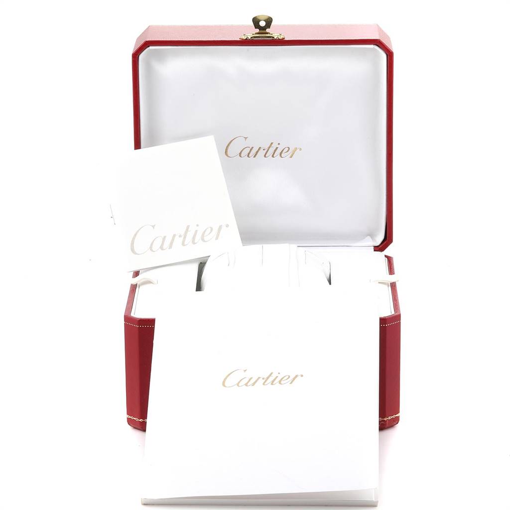 The image shows the packaging and accessories for the Cartier Ronde W6701011 Men
s Stainless Steel Silver Dial W6701011 Men
s Stainless Steel Silver Dial watch, including the box and branded booklets.