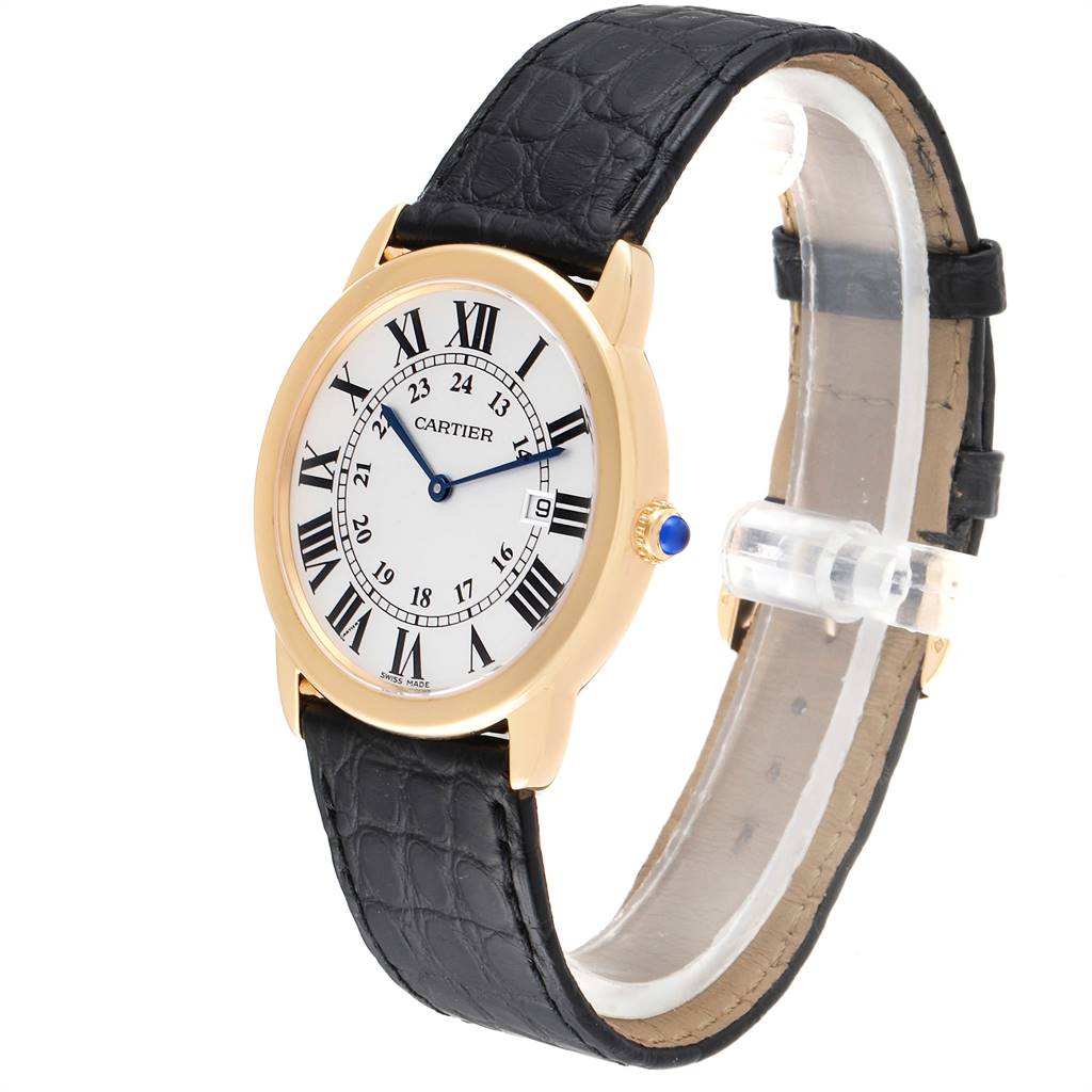 The image shows a Cartier Ronde W6700455 Men's Steel and Gold (two tone) Silver Dial W6700455 Men's Steel and Gold (two tone) Silver Dial watch at an angled view, displaying its face, gold casing, and black leather strap.