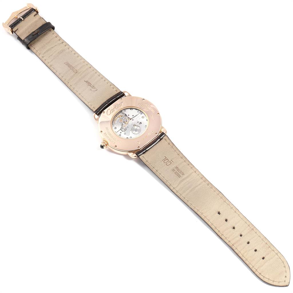 The image shows the back view of a Cartier Tank Louis W6800251 Men's Rose Gold Silver Dial W6800251 Men's Rose Gold Silver Dial watch, displaying the inner mechanism and leather straps.