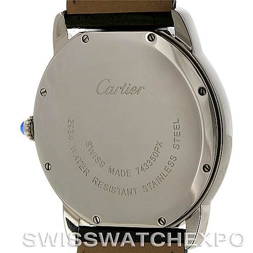 The image shows the back case of a Ronde model Cartier watch, highlighting its stainless steel case and blue sapphire crown.