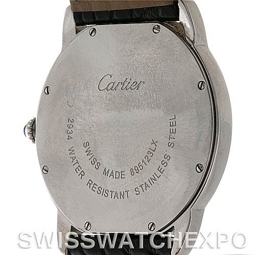 The image shows the back view of a Ronde model watch by Cartier, highlighting its stainless steel casing and inscriptions.