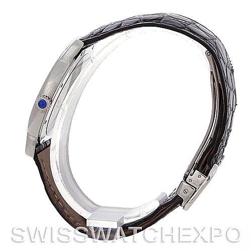 This is a side view of the Cartier Ronde W6700255 Men's Stainless Steel Silver Dial W6700255 Men's Stainless Steel Silver Dial watch, showcasing its case, crown, and leather strap.