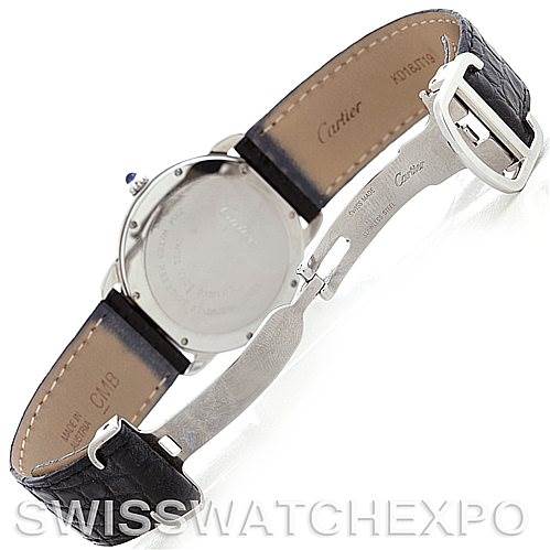 The image shows the back and strap of a Cartier Ronde W6700255 Men
s Stainless Steel Silver Dial W6700255 Men
s Stainless Steel Silver Dial watch at an angled top-down view, highlighting the buckle and markings.
