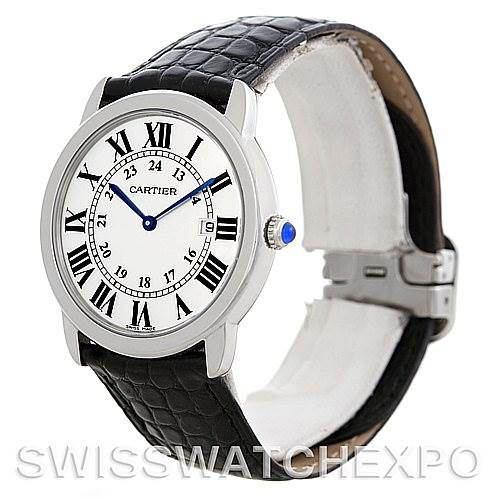 This image shows a Cartier Ronde W6700255 Men
s Stainless Steel Silver Dial W6700255 Men
s Stainless Steel Silver Dial watch at an angle displaying the face, crown, and black leather strap.