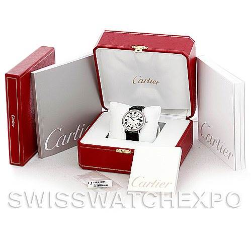 The image shows a Cartier Ronde W6700255 Men
s Stainless Steel Silver Dial W6700255 Men
s Stainless Steel Silver Dial watch displayed at an angle inside its open red and white box, accompanied by documentation and packaging.