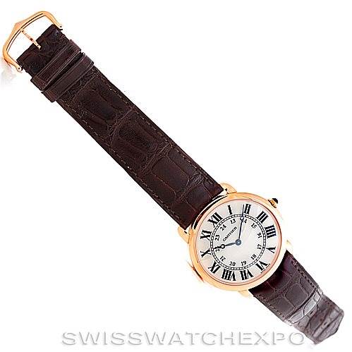This image shows a Cartier Ronde W6800251 Men
s Rose Gold Silver Dial W6800251 Men
s Rose Gold Silver Dial model watch from a top-down angle, displaying its face and brown leather strap.