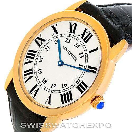 This image shows a close-up angled view of the Cartier Ronde W6700455 Men's Steel and Gold (two tone) Silver Dial W6700455 Men's Steel and Gold (two tone) Silver Dial model watch, highlighting its face, gold case, and leather strap.