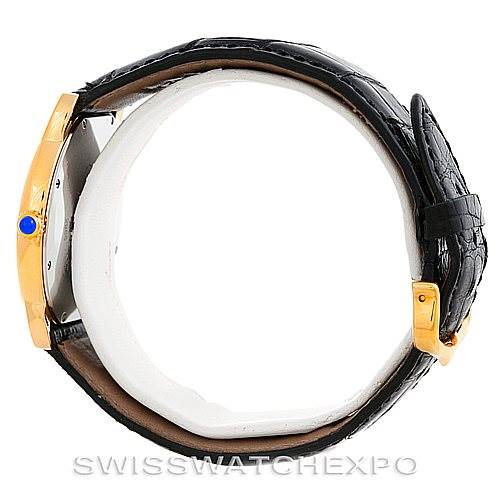 This image shows a side view of the Cartier Ronde W6700455 Men's Steel and Gold (two tone) Silver Dial W6700455 Men's Steel and Gold (two tone) Silver Dial watch, featuring the case profile and black leather strap.