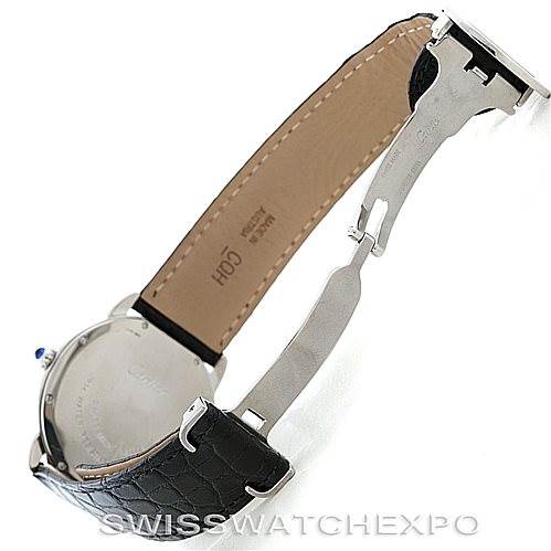The image shows the back and side view of the Ronde model by Cartier, highlighting its leather strap and deployment clasp.