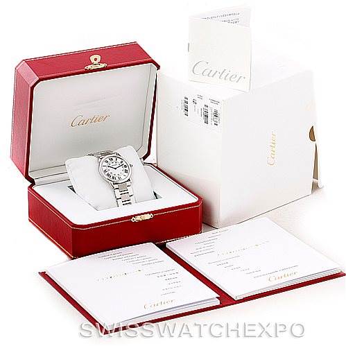 The image shows a Cartier Ronde W6701005 Men's Stainless Steel Silver Dial W6701005 Men's Stainless Steel Silver Dial watch in an open red box, accompanied by documentation and a white outer box.