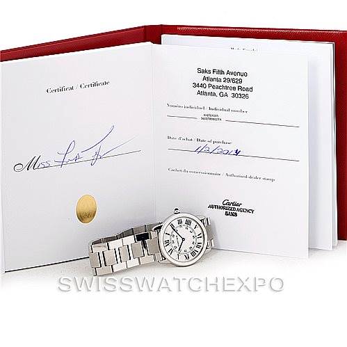The image shows a Cartier Ronde W6701005 Men's Stainless Steel Silver Dial W6701005 Men's Stainless Steel Silver Dial model watch with its certification papers and box at an angle, displaying the face and bracelet.