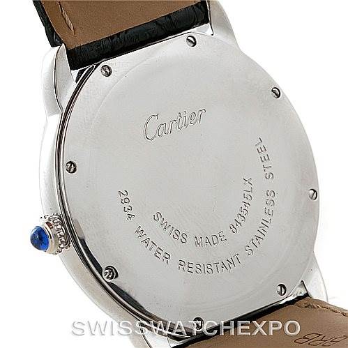 The image shows the back case and crown of a Cartier Ronde W6700255 Men's Stainless Steel Silver Dial W6700255 Men's Stainless Steel Silver Dial watch, displaying the brand's engraving and details.