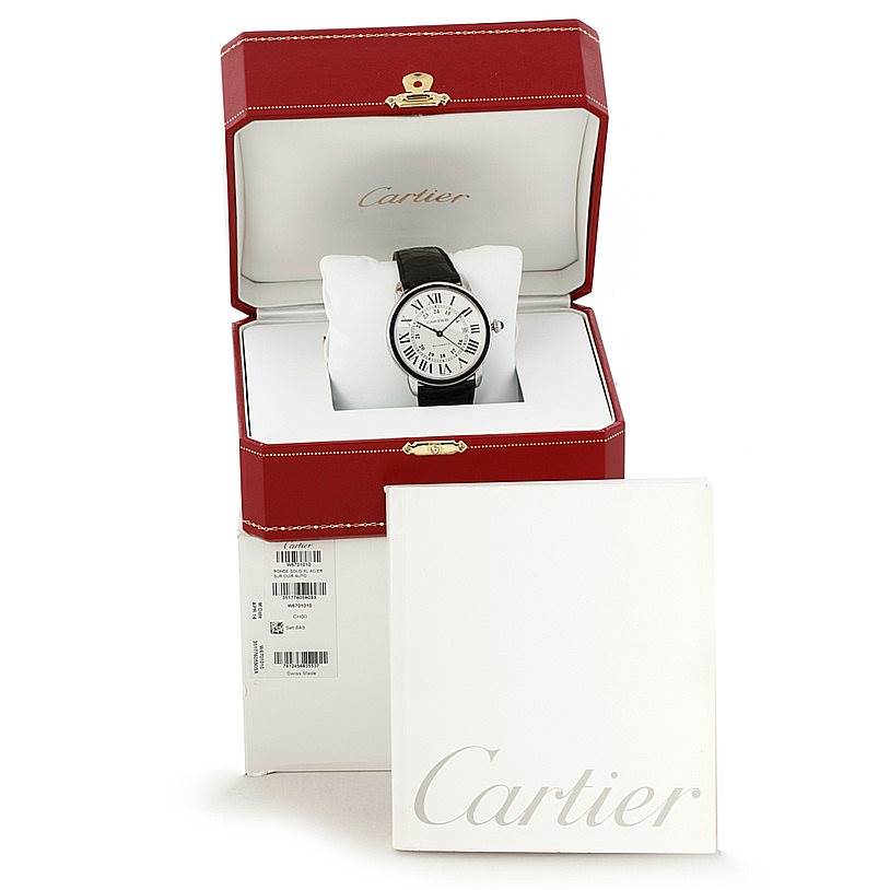 The image shows the Cartier Ronde W6701010 Men's Stainless Steel Silver Dial W6701010 Men's Stainless Steel Silver Dial watch at a front angle inside its red, opened case, with the box and booklet.