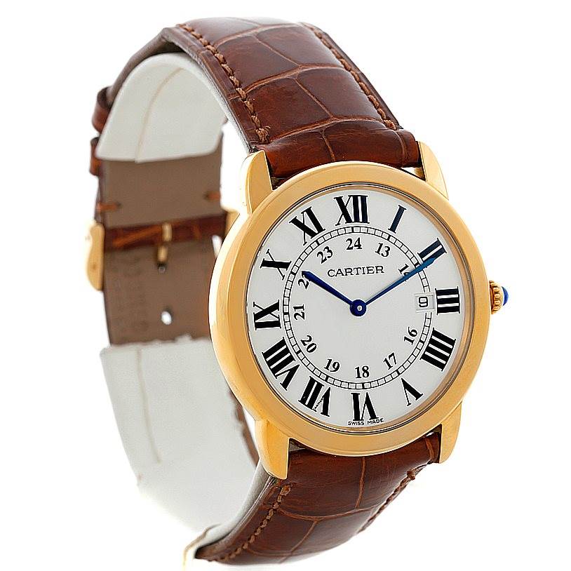The image shows a side-angle view of a Cartier Ronde W6700455 Men's Steel and Gold (two tone) Silver Dial W6700455 Men's Steel and Gold (two tone) Silver Dial watch, featuring a leather strap and round face with Roman numerals.