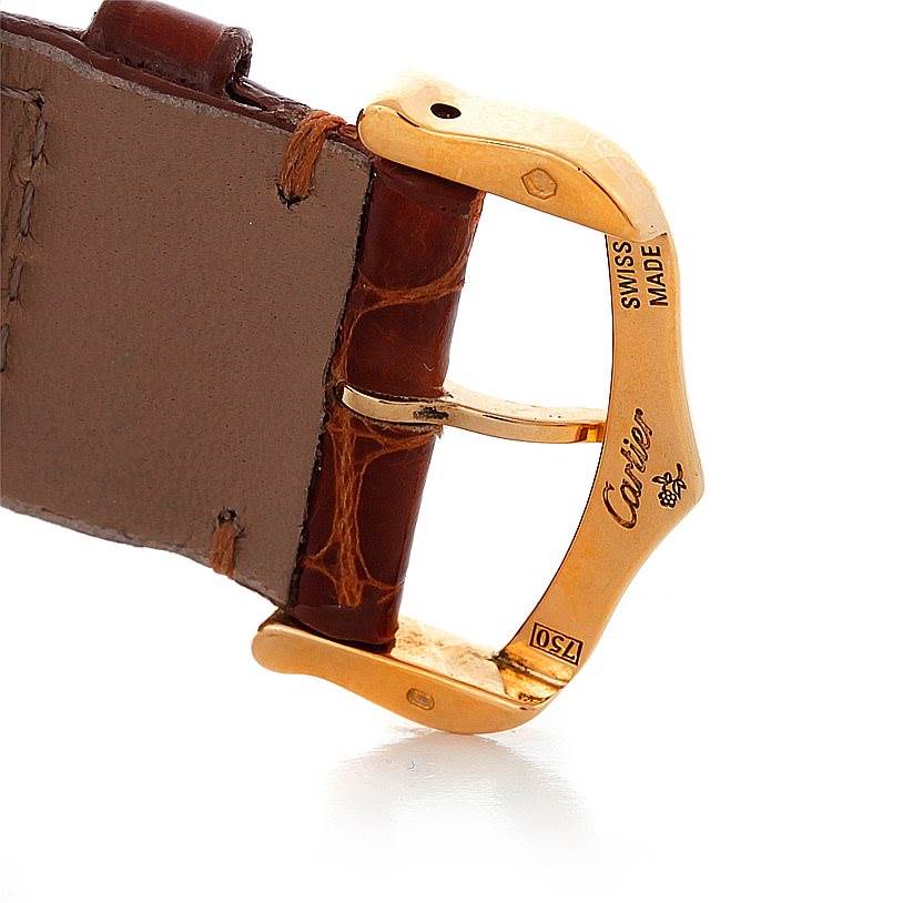 The image shows a close-up of the buckle and part of the leather strap of the Cartier Ronde W6700455 Men's Steel and Gold (two tone) Silver Dial W6700455 Men's Steel and Gold (two tone) Silver Dial watch, highlighting brand engravings.