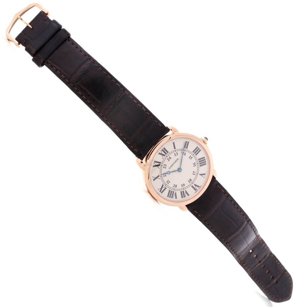 The image shows a Cartier Ronde W6800251 Men
s Rose Gold Silver Dial W6800251 Men
s Rose Gold Silver Dial watch laid flat, displaying its face, strap, and buckle from an overhead angle.