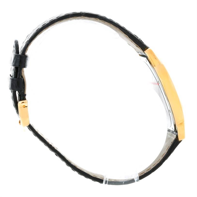 The image shows a side view of a Cartier Ronde W6700455 Men
s Steel and Gold (two tone) Silver Dial W6700455 Men
s Steel and Gold (two tone) Silver Dial model, highlighting its gold case and black leather strap.