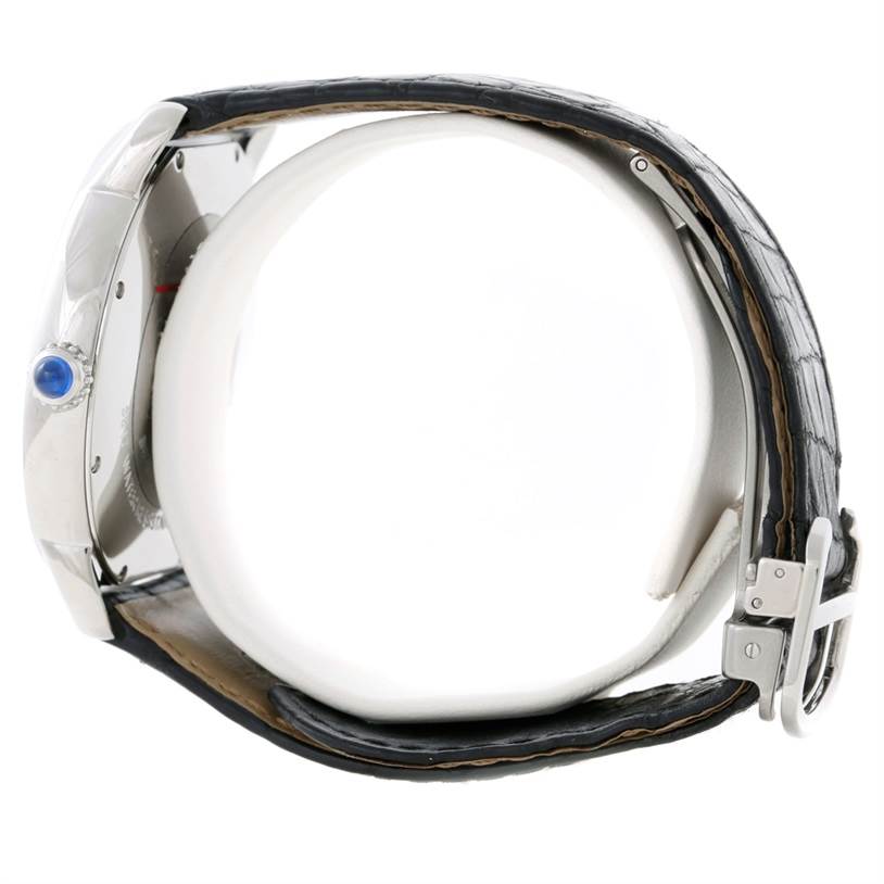 This image shows a side view of the Cartier Ronde W6701010 Men
s Stainless Steel Silver Dial W6701010 Men
s Stainless Steel Silver Dial model watch, highlighting the crown and leather strap with buckle.