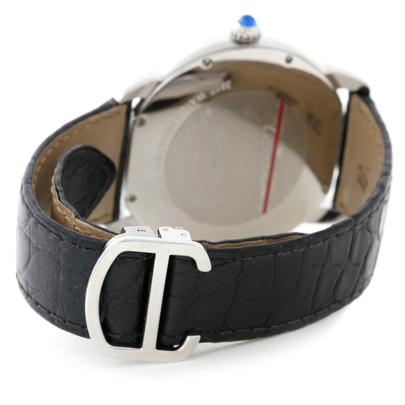 The image shows the back view of a Cartier Ronde W6701010 Men
s Stainless Steel Silver Dial W6701010 Men
s Stainless Steel Silver Dial watch focusing on the buckle and leather strap.
