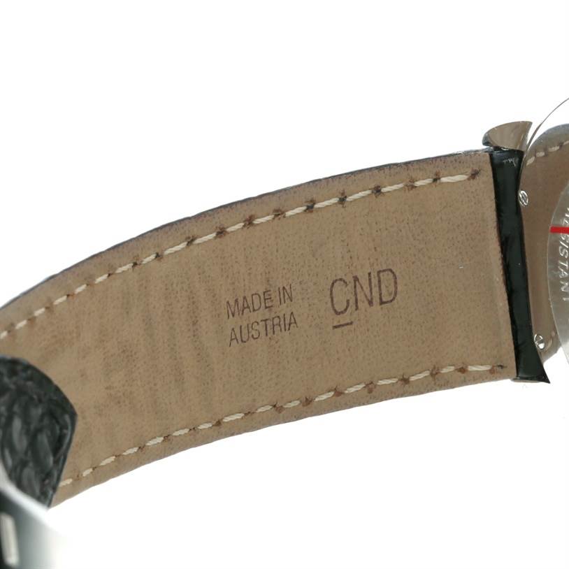 This image shows the inside of the leather strap and the back side of the Ronde model by Cartier.