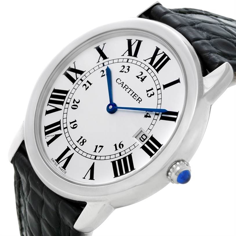 This image shows a Cartier Ronde W6700255 Men's Stainless Steel Silver Dial W6700255 Men's Stainless Steel Silver Dial watch from an angled view highlighting its face, Roman numeral markers, blue hands, and part of the leather strap.