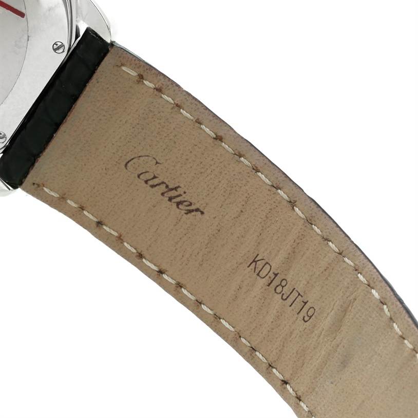 The image shows the back of the leather strap of a Cartier Ronde W6700255 Men's Stainless Steel Silver Dial W6700255 Men's Stainless Steel Silver Dial watch, highlighting the engraved brand name and stitching.