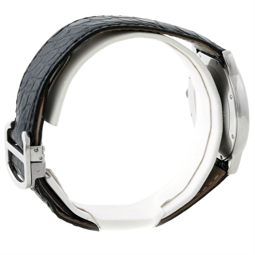 The image shows a side view of the Cartier Ronde W6700255 Men's Stainless Steel Silver Dial W6700255 Men's Stainless Steel Silver Dial watch, highlighting its leather strap and metal buckle.