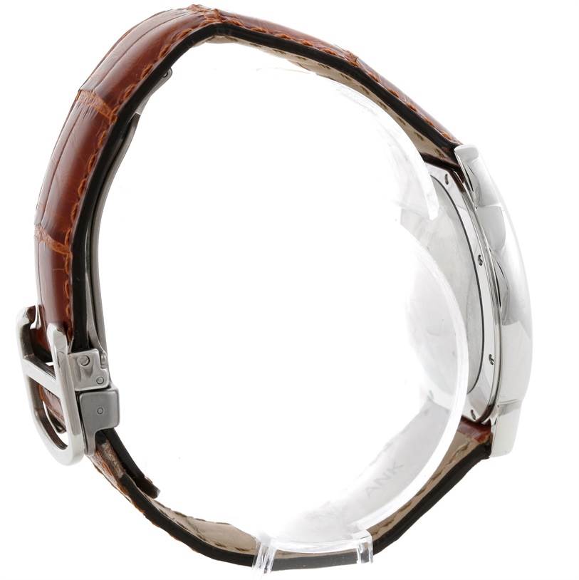 The image shows a side view of the Cartier Ronde W6700255 Stainless Steel Silver Dial W6700255 Stainless Steel Silver Dial watch, highlighting its leather strap and metal case.