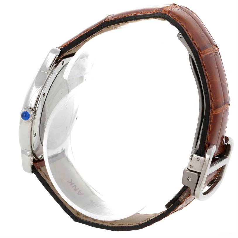 This image shows a side profile of the Cartier Ronde W6700255 Stainless Steel Silver Dial W6700255 Stainless Steel Silver Dial model watch, highlighting the brown leather strap and case details.