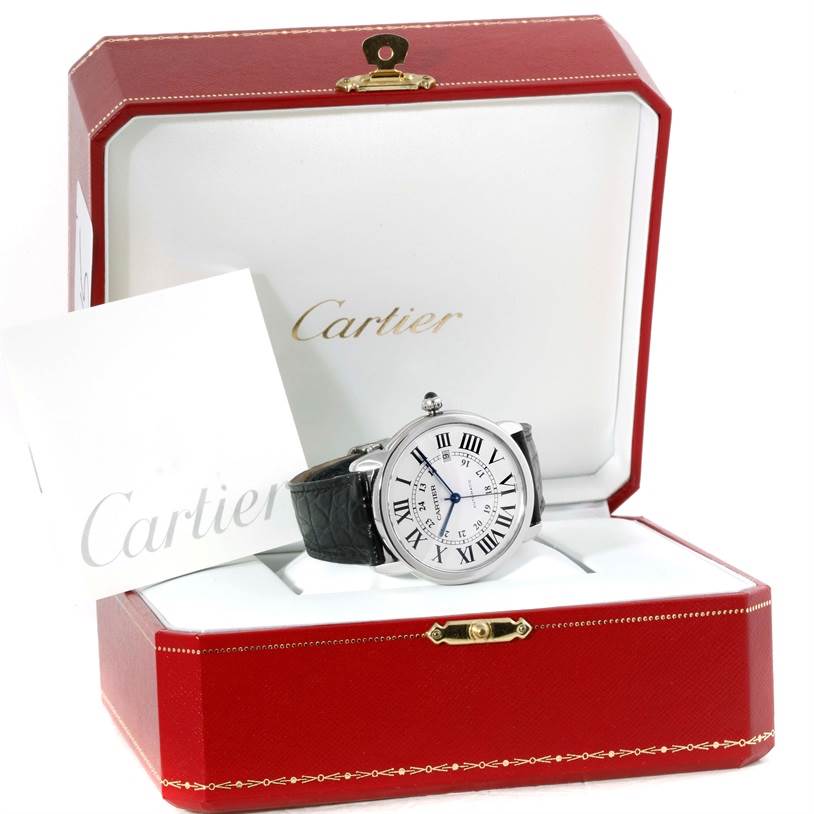 The Cartier Ronde W6701010 Men
s Stainless Steel Silver Dial W6701010 Men
s Stainless Steel Silver Dial watch is shown at a front angle, positioned inside its red Cartier box with a visible card.
